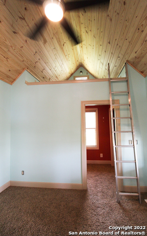 955 Faurie Road, Unit TINY HOUSE Lakehills, TX 78063 - Photo 9 of 23 a view of a livingroom with a fireplace
