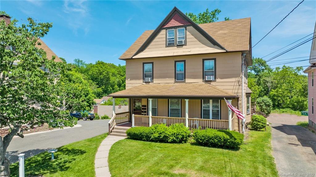 491 West Main Street Meriden, CT 06451 - Photo 1 of 1 a view of a house with a yard and plants