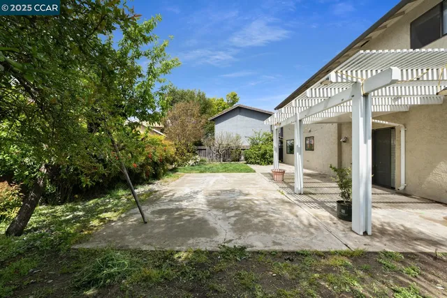 a view of a building with a yard