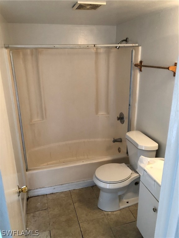 824 Alderman Street, Unit 209 Fort Myers, FL 33916 - Photo 5 of 7 a bathroom with a toilet and a shower