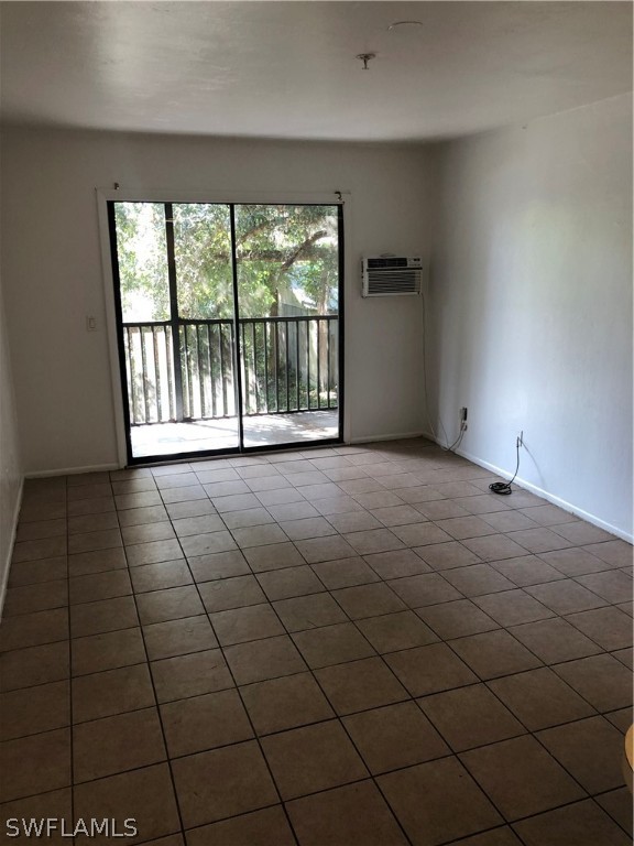 824 Alderman Street, Unit 209 Fort Myers, FL 33916 - Photo 7 of 7 a view of an empty room and a window