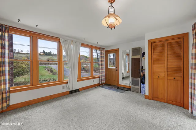 a kitchen with sink a stove and cabinets