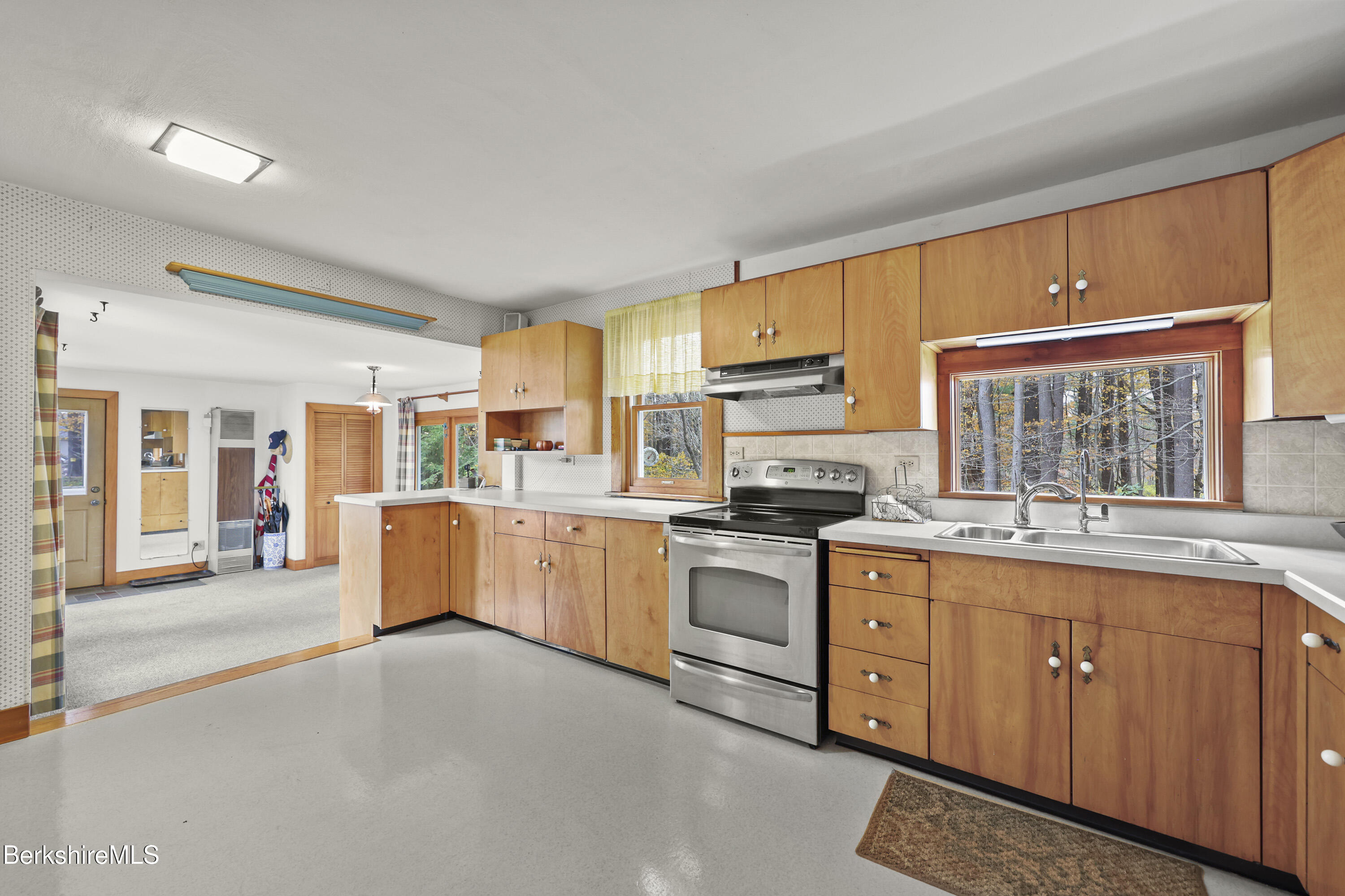1772 Swamp Road Richmond, MA 01254 - Photo 15 of 62 a kitchen with sink a stove and cabinets