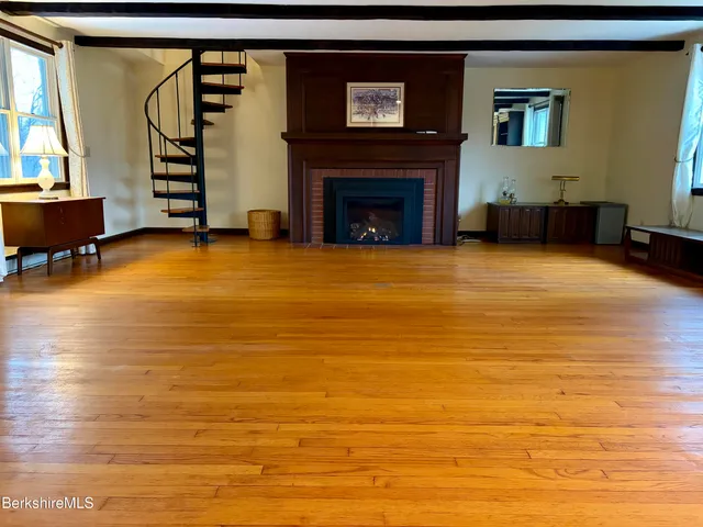 a view of livingroom with furniture and fireplace