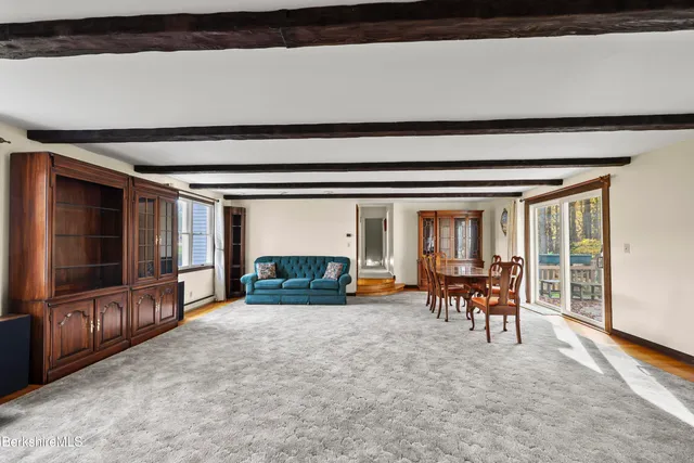 a view of a livingroom with furniture and window