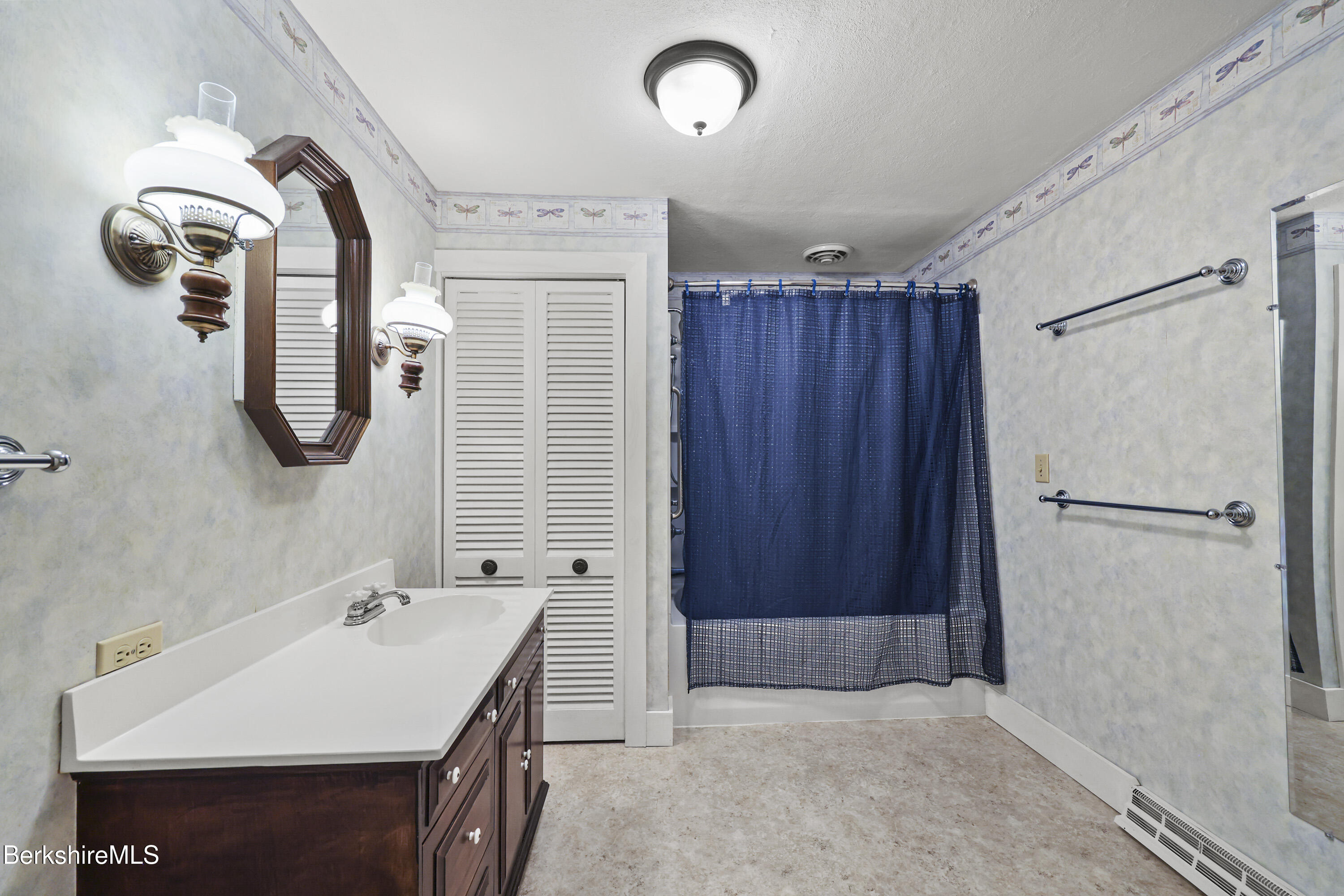 1772 Swamp Road Richmond, MA 01254 - Photo 29 of 62 a bathroom with a sink and mirror