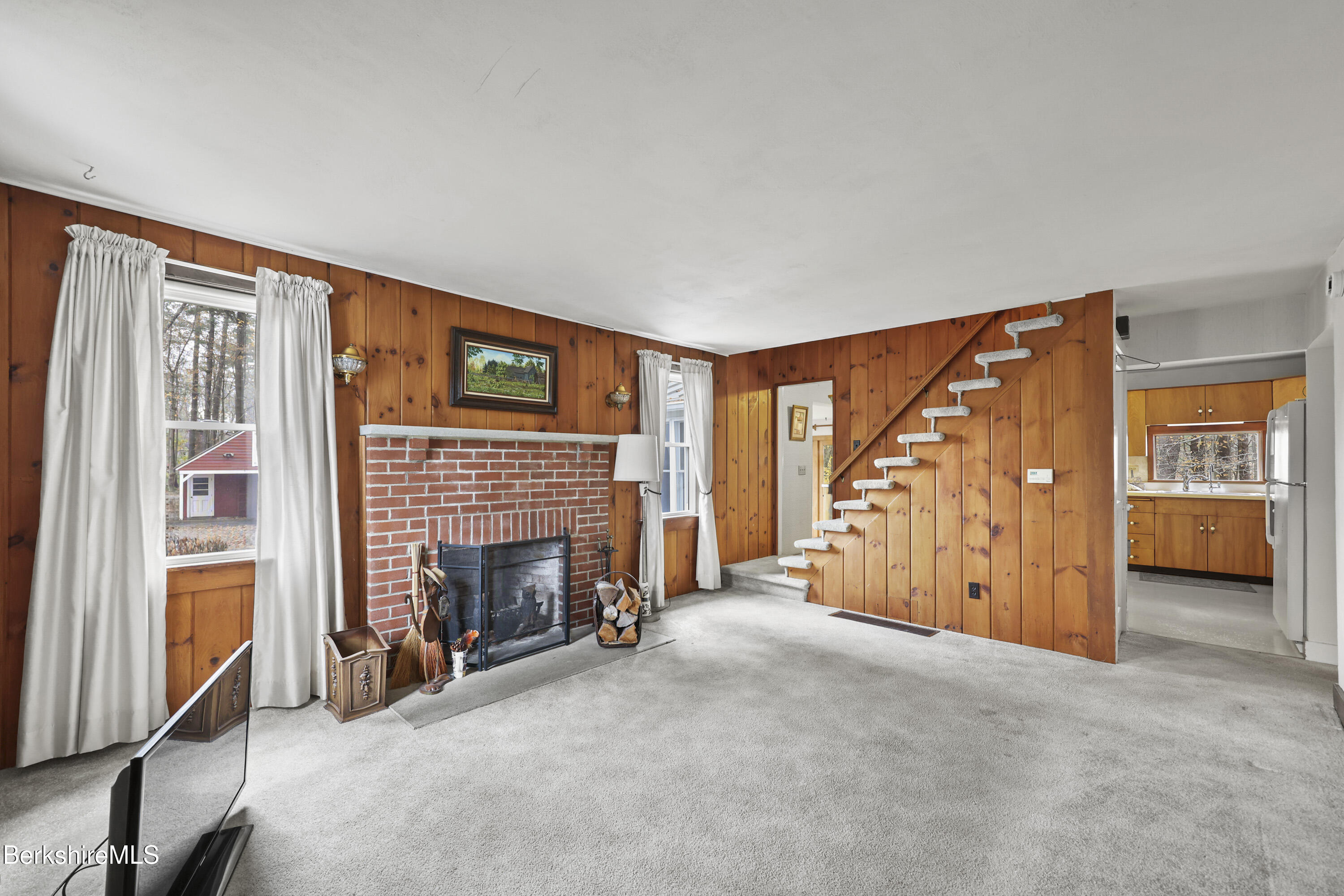 1772 Swamp Road Richmond, MA 01254 - Photo 33 of 62 a view of an empty room with fireplace and a window
