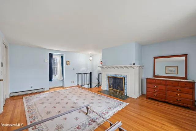 a room with gym equipment and view of living room