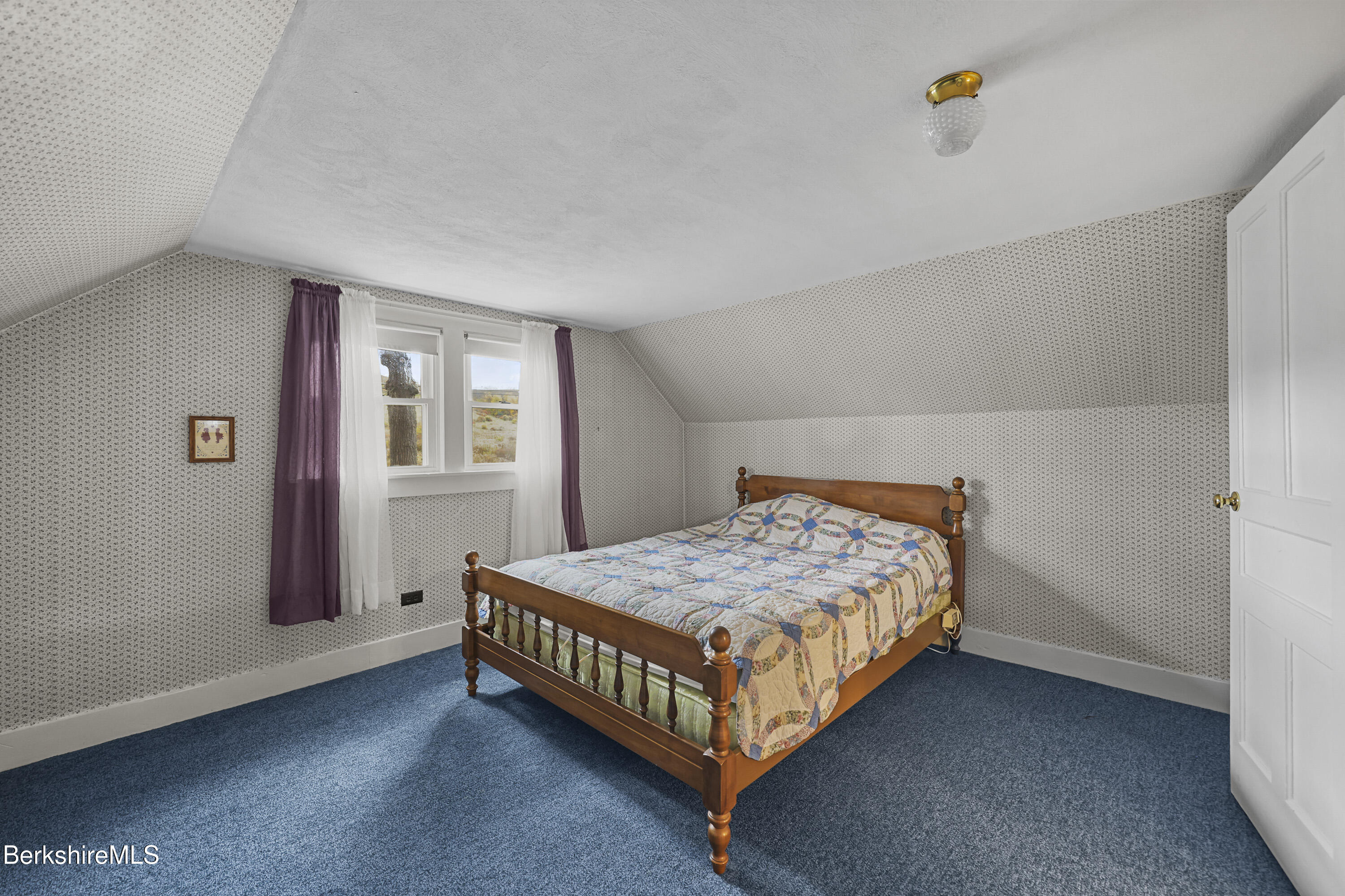 1772 Swamp Road Richmond, MA 01254 - Photo 41 of 62 a bedroom with a bed lamp and a window