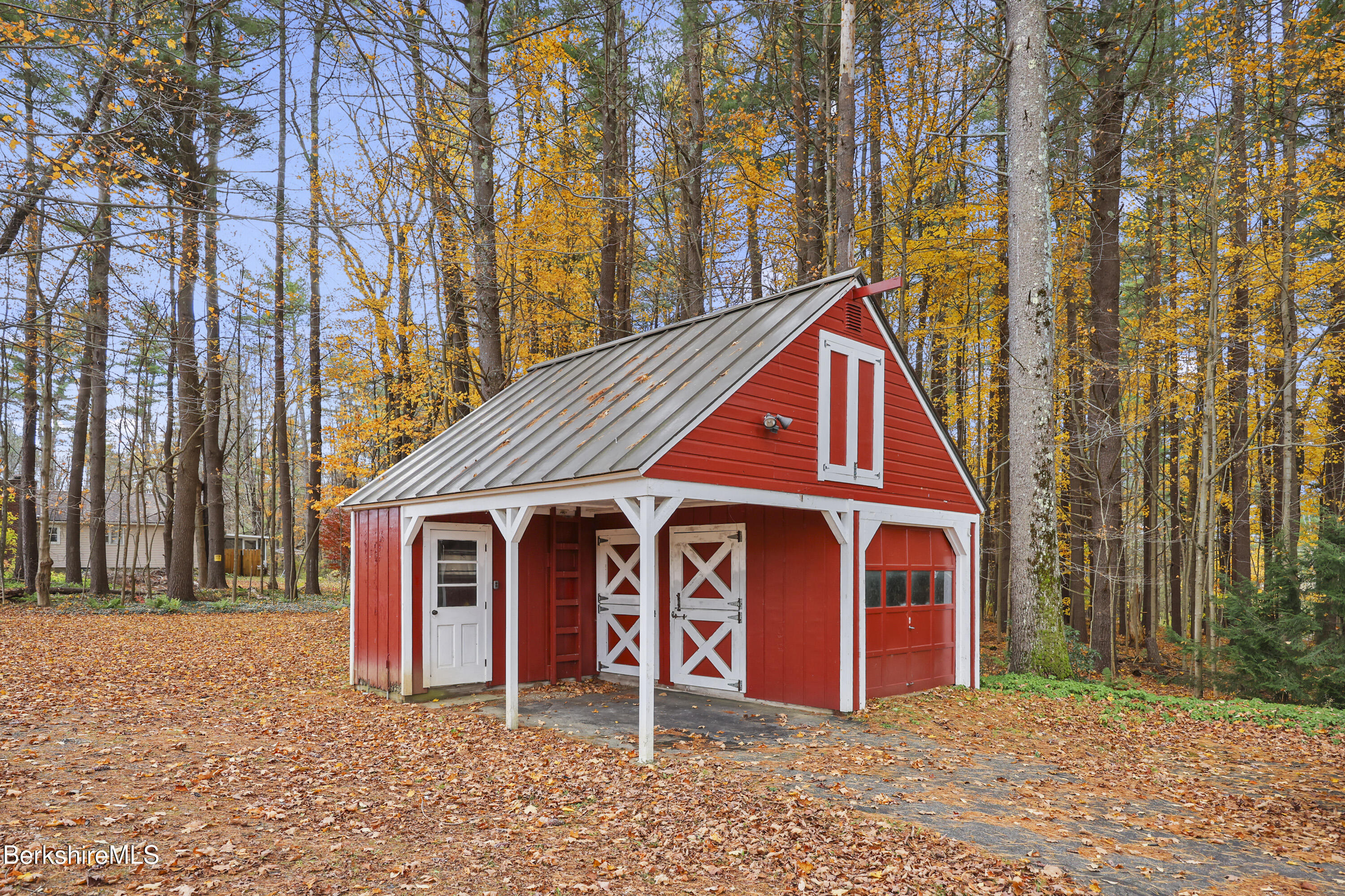 1772 Swamp Road Richmond, MA 01254 - Photo 5 of 62 a front view of a house with garden