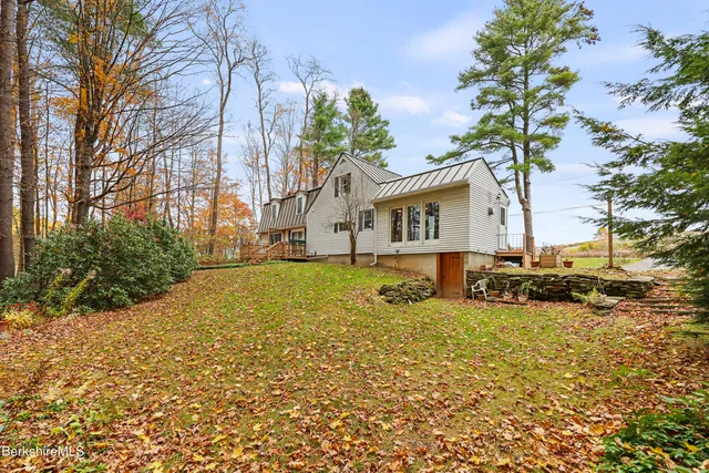 a view of backyard with green space