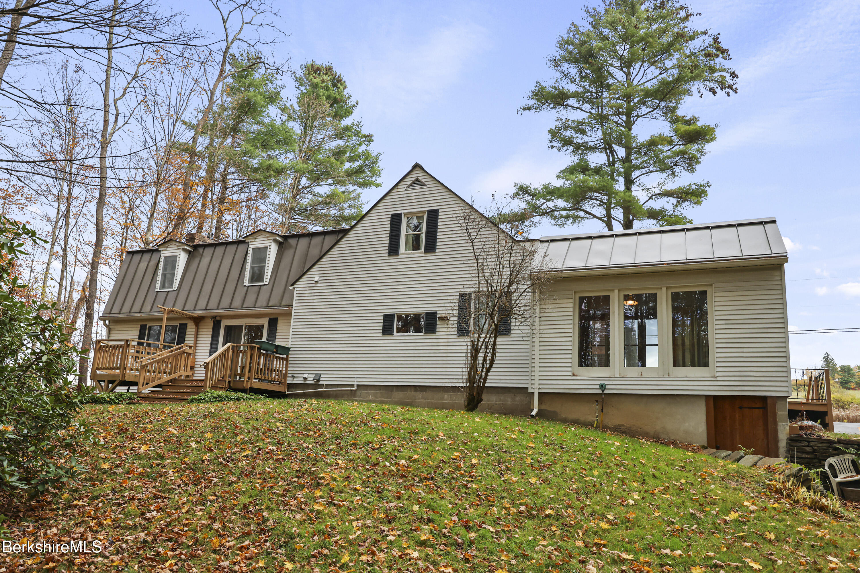 1772 Swamp Road Richmond, MA 01254 - Photo 9 of 62 a front view of a house with garden