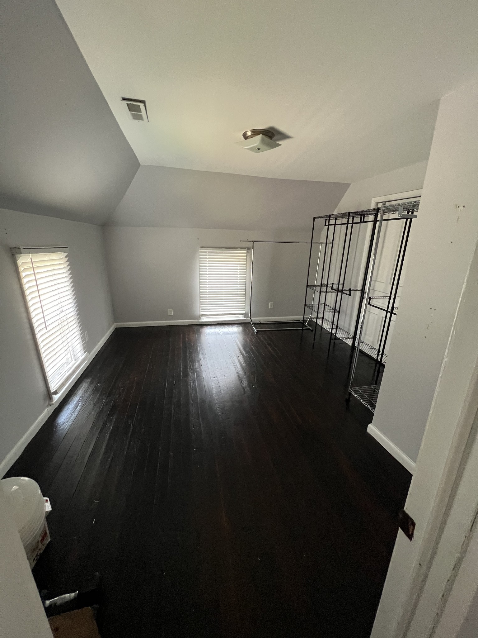 201 Pleasant Street Mount Pleasant, TN 38474 - Photo 37 of 38 an empty room with wooden floor and windows