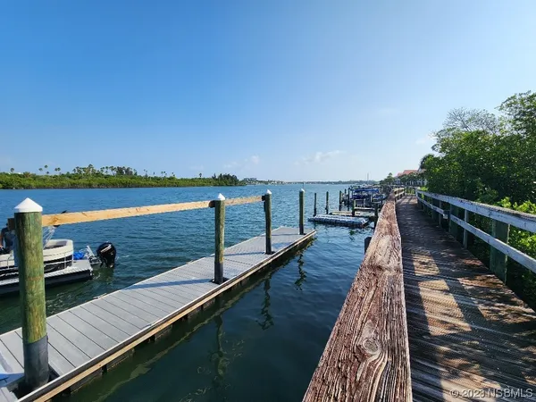 a view of wooden floor with a lake