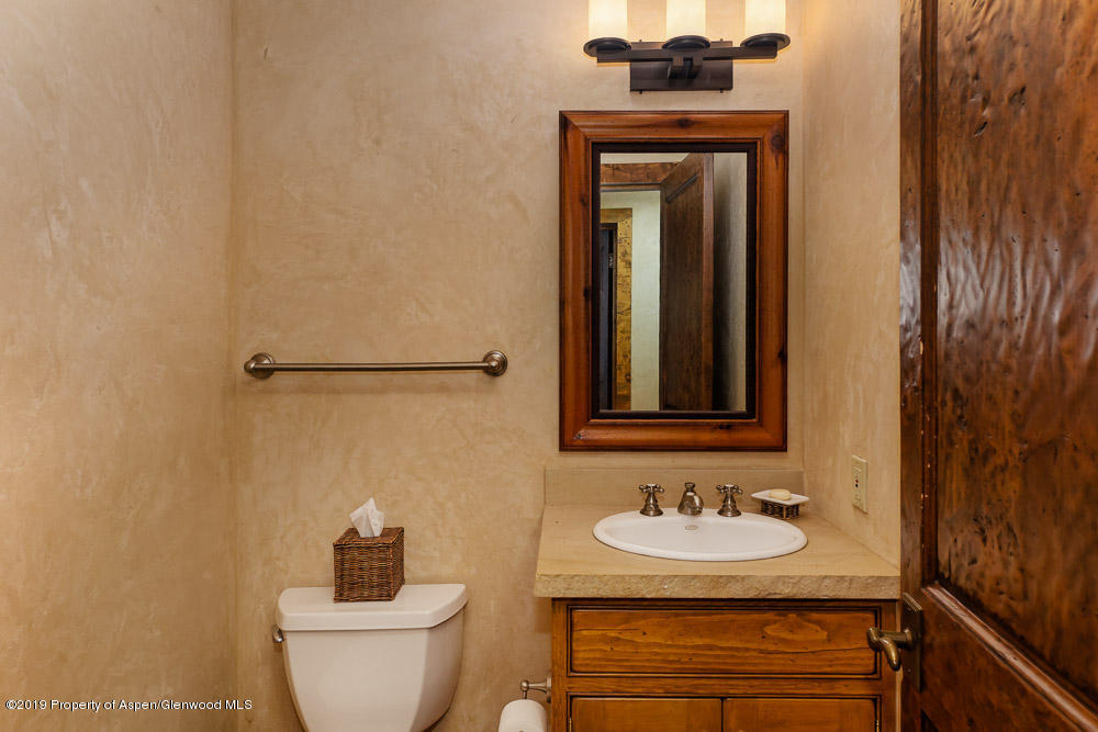 43 Altamira Ranch Road Basalt, CO 81621 - Photo 12 of 29 a bathroom with a sink and a mirror