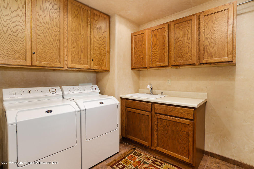 43 Altamira Ranch Road Basalt, CO 81621 - Photo 19 of 29 a utility room with dryer and washer