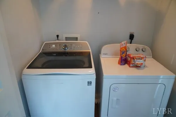 a utility room with dryer and washer