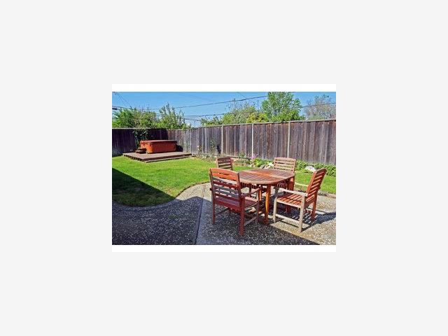 5498 Yale Drive San Jose, CA 95118 - Photo 7 of 9 a outdoor sitting area with chairs and a table
