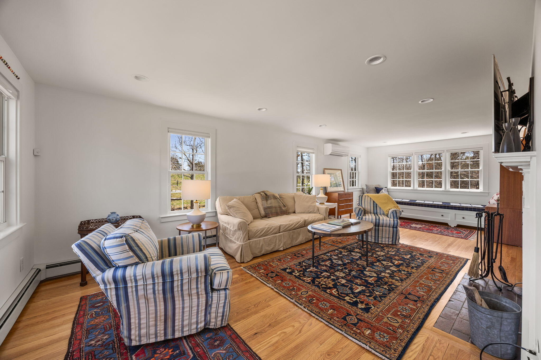 58 Stepping Stones Road Chatham, MA 02633 - Photo 12 of 52 a living room with furniture and a rug