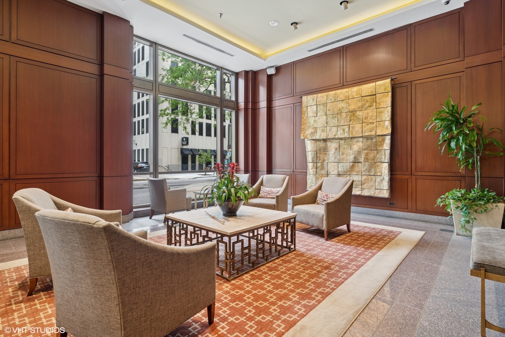 401 East Ontario Street, Unit 809 Chicago, IL 60611 - Photo 2 of 23 a living room with furniture and large windows