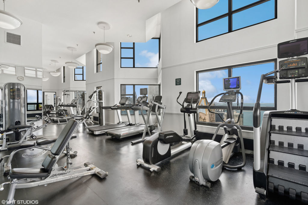 401 East Ontario Street, Unit 809 Chicago, IL 60611 - Photo 21 of 23 a view of a room with gym equipment