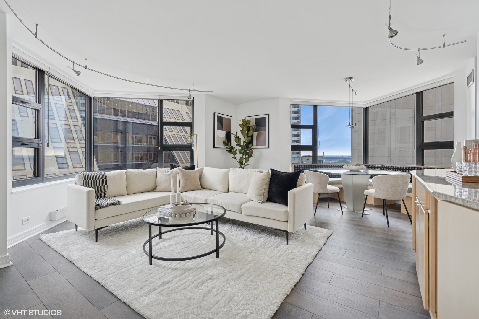 401 East Ontario Street, Unit 809 Chicago, IL 60611 - Photo 4 of 23 a living room with furniture and a large window