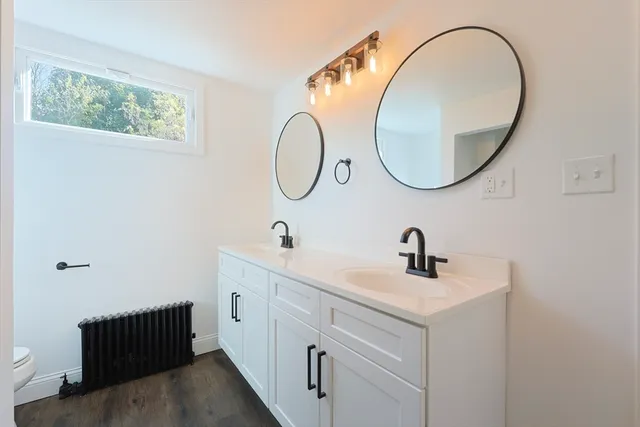 a bathroom with a sink and a bathtub