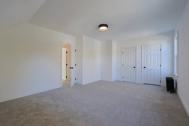 an empty room with a empty space and window