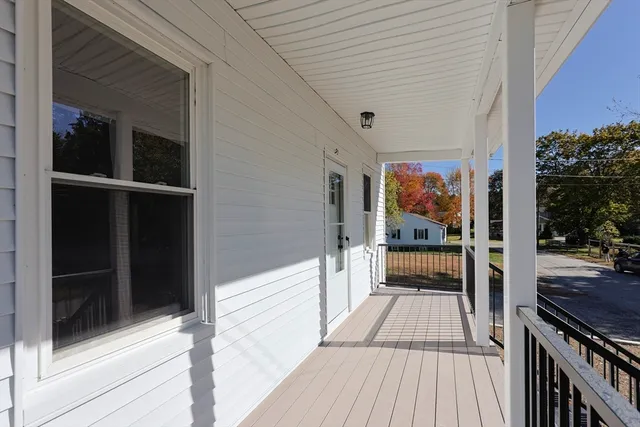 a view of a balcony with door