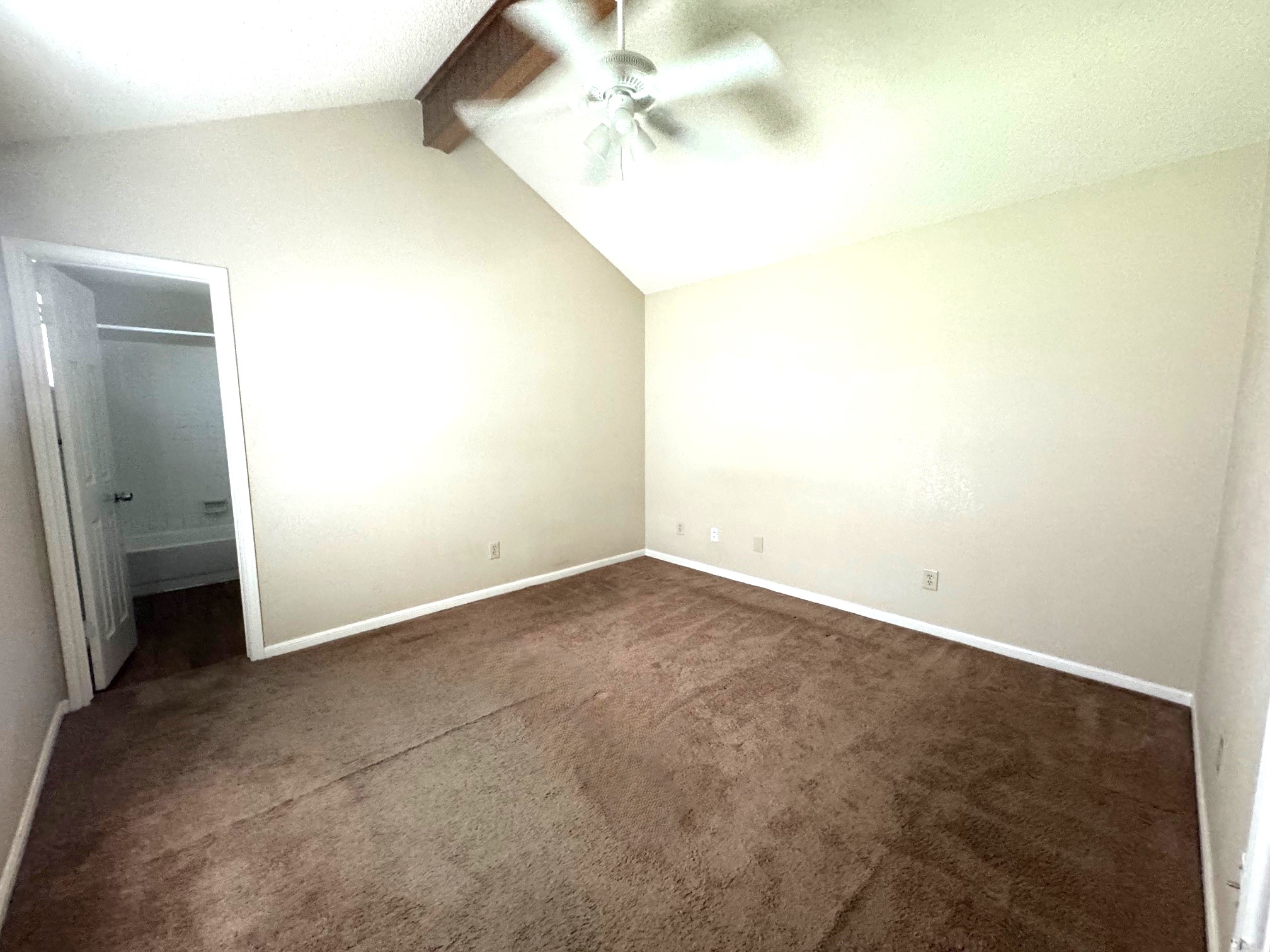 117 Quail Cove, Unit A Lockhart, TX 78644 - Photo 5 of 12 an empty room with a bathroom