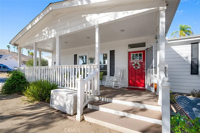a view of a house with a small porch