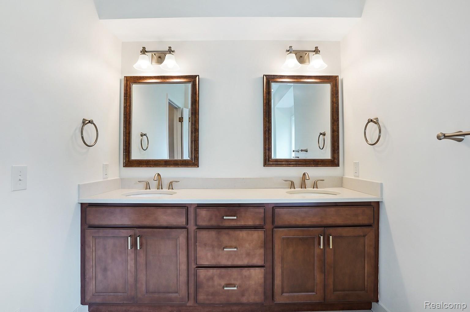 1023 Stony Pointe Boulevard Rochester, MI 48307 - Photo 19 of 43 Updated dual sinks in the master bathroom