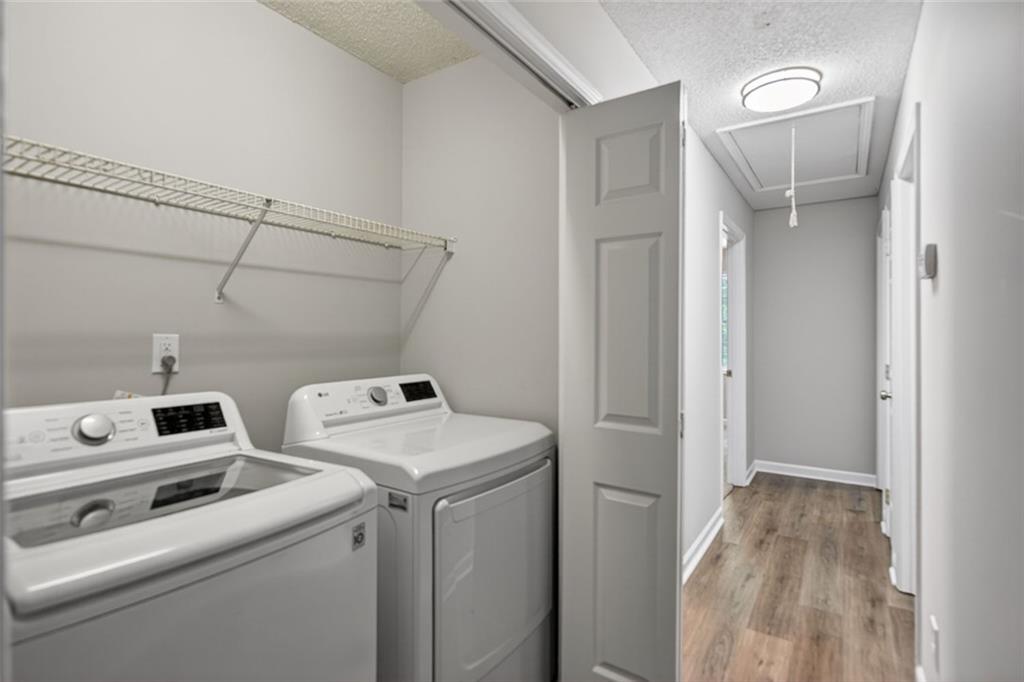 190 Killian Street Canton, GA 30114 - Photo 15 of 44 a utility room with dryer and washer