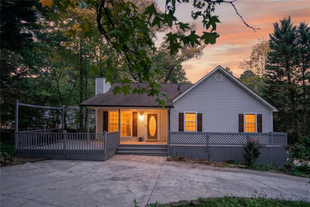 190 Killian Street Canton, GA 30114 - Photo 2 of 44 a front view of a house with a yard