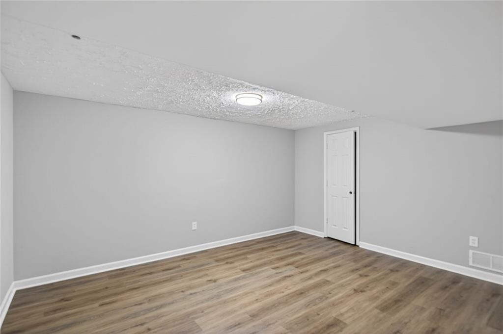 190 Killian Street Canton, GA 30114 - Photo 26 of 44 a view of an empty room