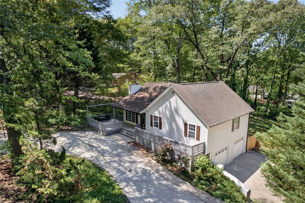 190 Killian Street Canton, GA 30114 - Photo 34 of 44 an aerial view of a house with a yard