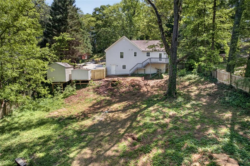 190 Killian Street Canton, GA 30114 - Photo 36 of 44 an aerial view of a house with a yard