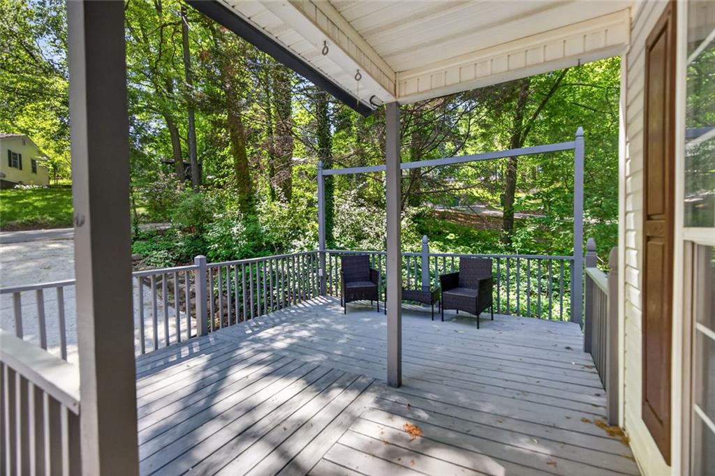 190 Killian Street Canton, GA 30114 - Photo 5 of 44 a view of a porch with wooden floor and outdoor space