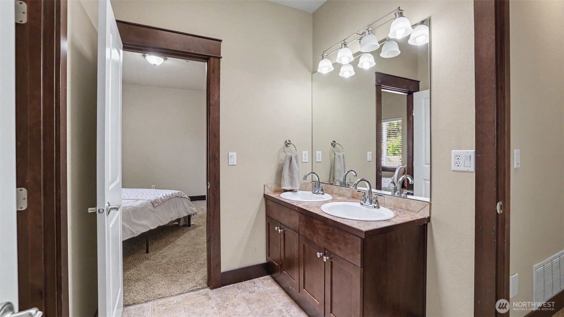1357 Elma Place Northeast Renton, WA 98059 - Photo 24 of 40 a en suite bathroom with a sink vanity and a mirror