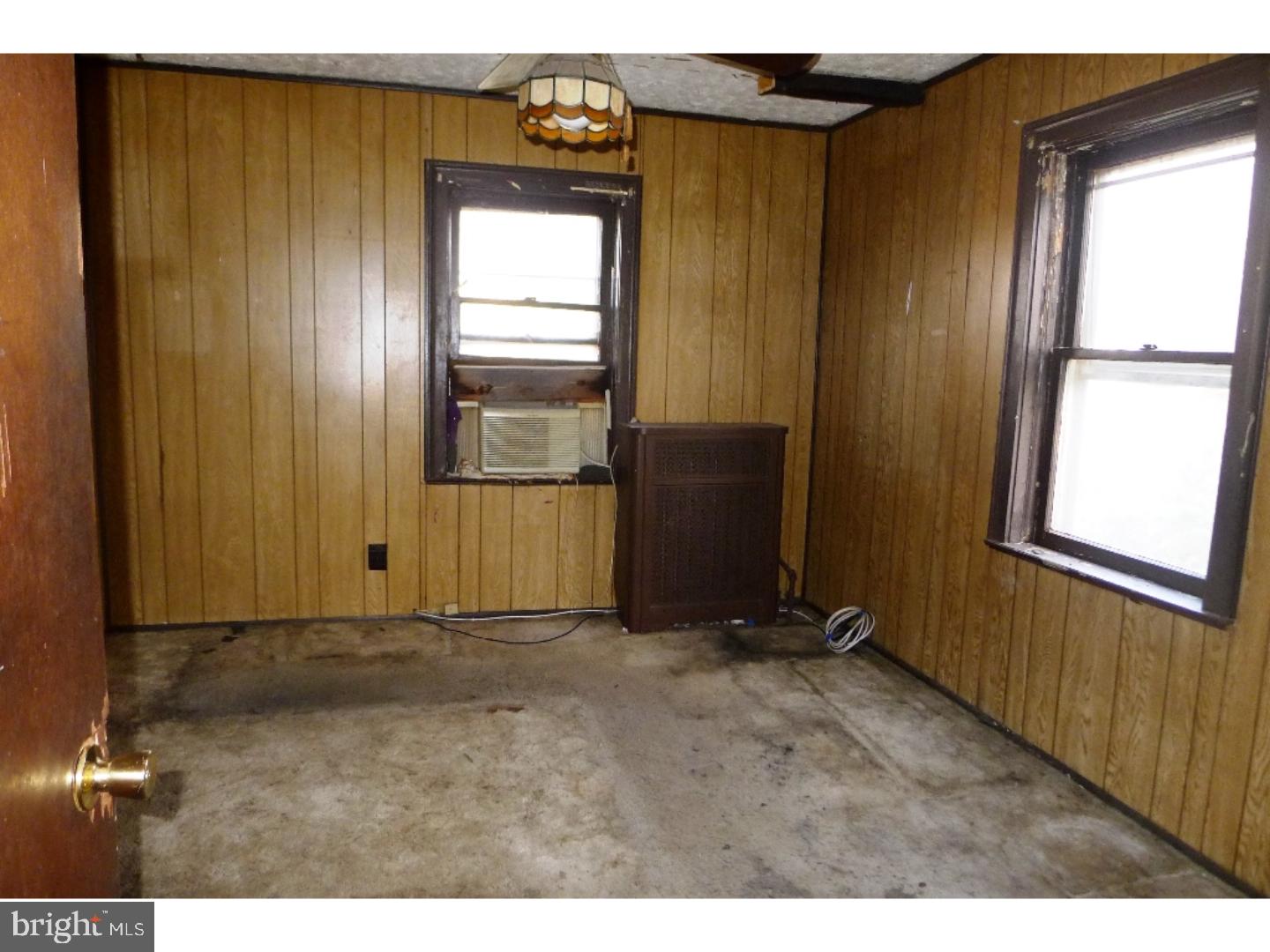 3129 South Atlanta Road Camden, NJ 08104 - Photo 11 of 13 a view of an empty room with a window