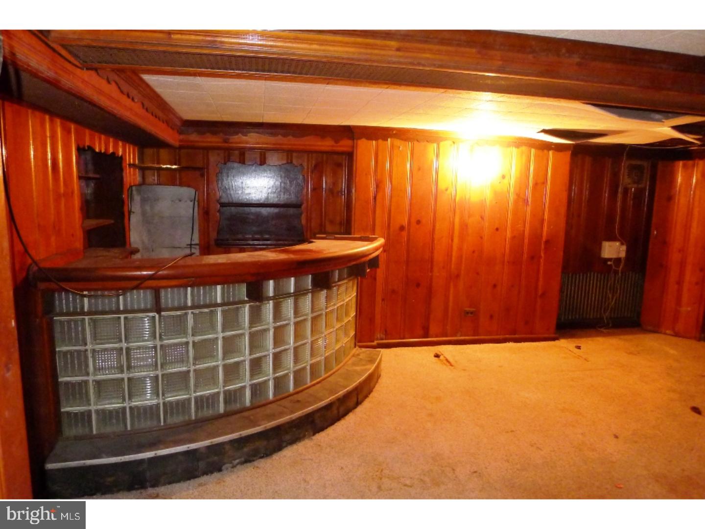 3129 South Atlanta Road Camden, NJ 08104 - Photo 10 of 13 a view of an empty room with wooden floor