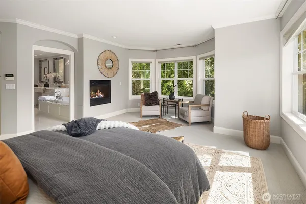 a spacious bathroom with sinks mirror and a bathtub