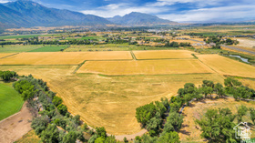 19 East Southfield Road Spanish Fork, UT 84660 - Photo 18 of 74 Aerial view of sparsely populated area with a mountainous background