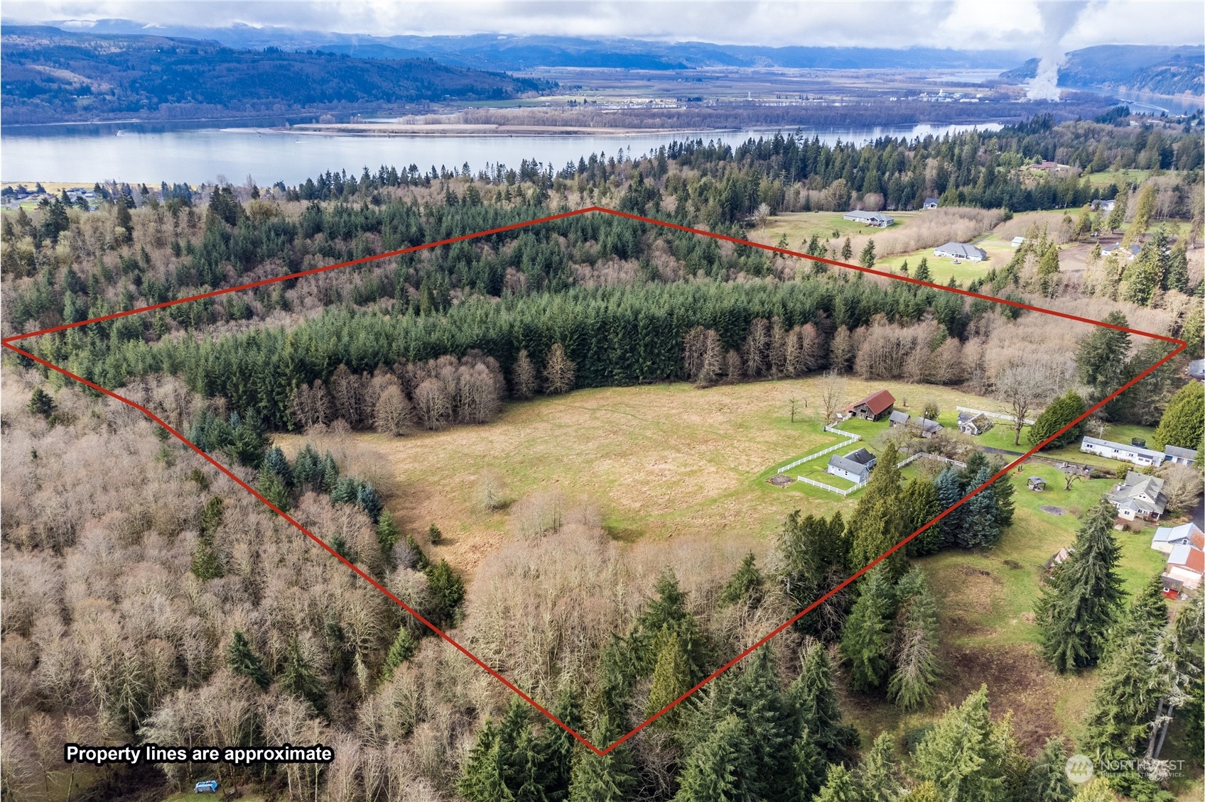 1313 Stella Road Longview, WA 98632 - Photo 3 of 20 a view of a city with mountains in the background