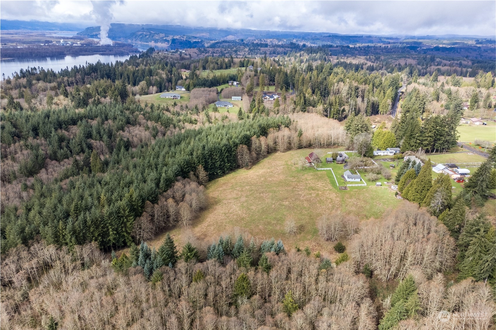 1313 Stella Road Longview, WA 98632 - Photo 8 of 20 a view of a lake in middle of the town