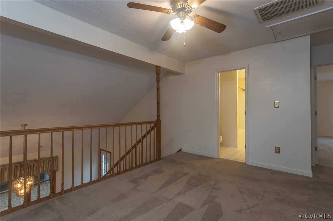 3840 Doe Run Road Hopewell, VA 23860 - Photo 27 of 46 a view of a hallway with a chandelier fan
