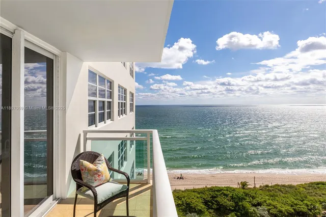 a view of a lake from a balcony