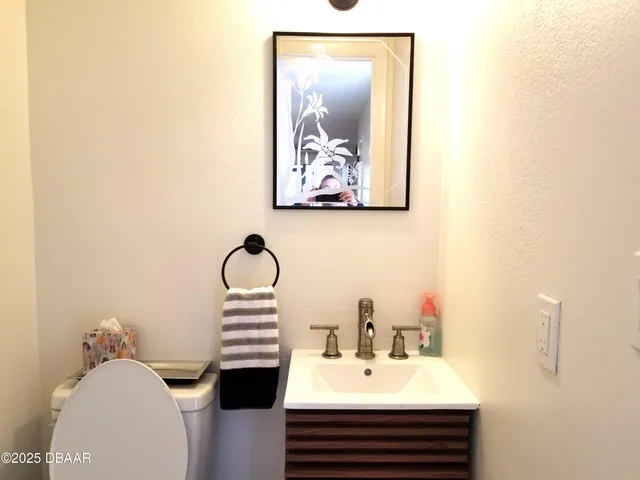 a view of a room with cabinet and floor to ceiling window