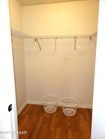 a view of a room with racks on the wall