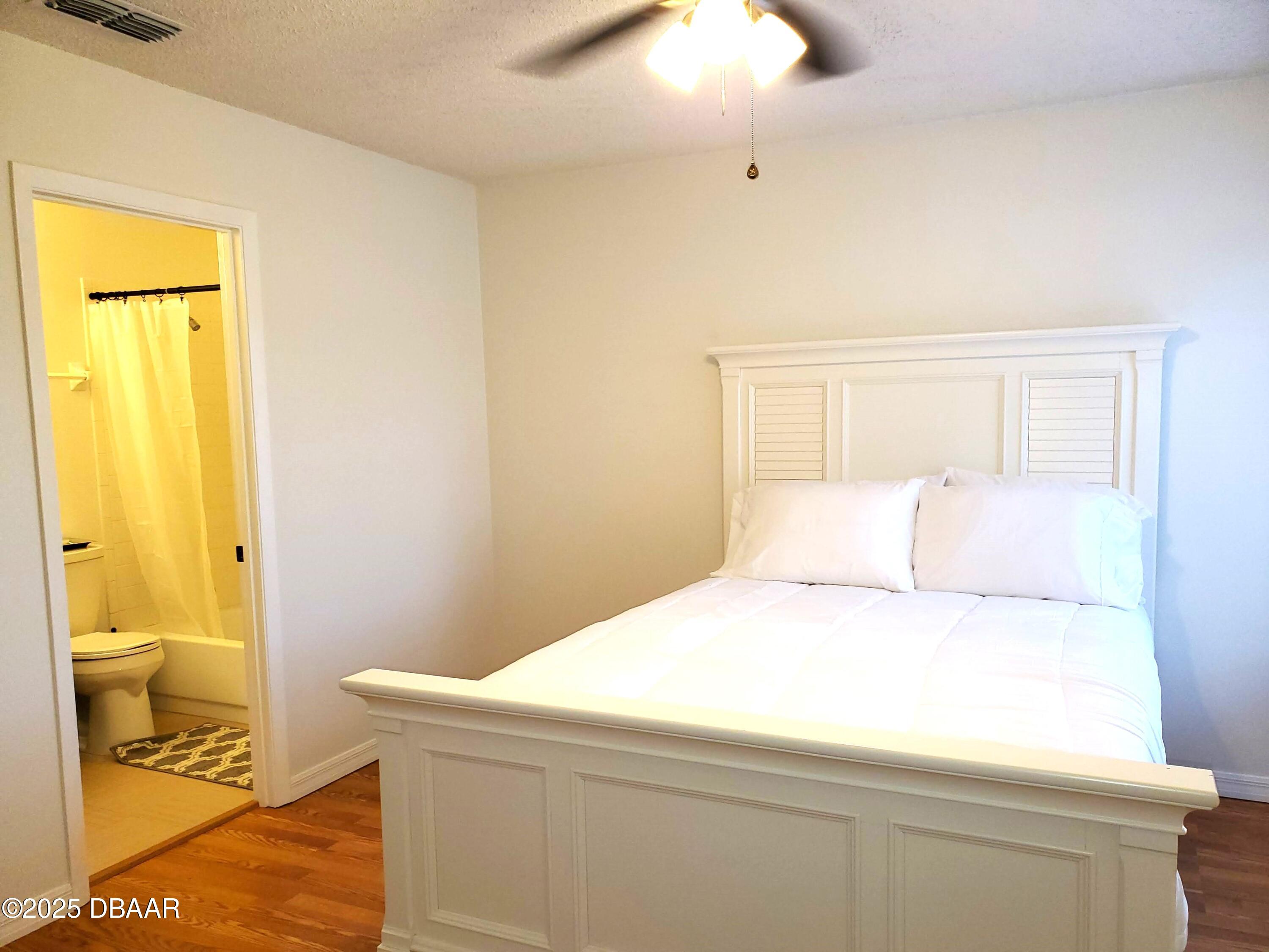 165 White Fawn Drive, Unit MB Daytona Beach, FL 32114 - Photo 30 of 34 a bathroom with a sink and a toilet